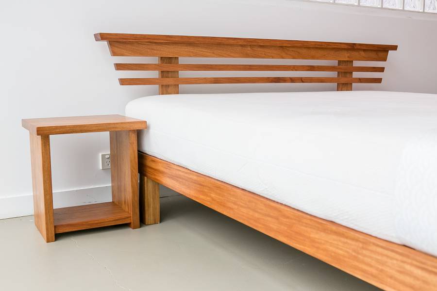 Sono Bedframe and sidetable in New Guinea Rosewood